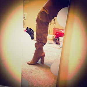 Tan baggy thigh high boots!
